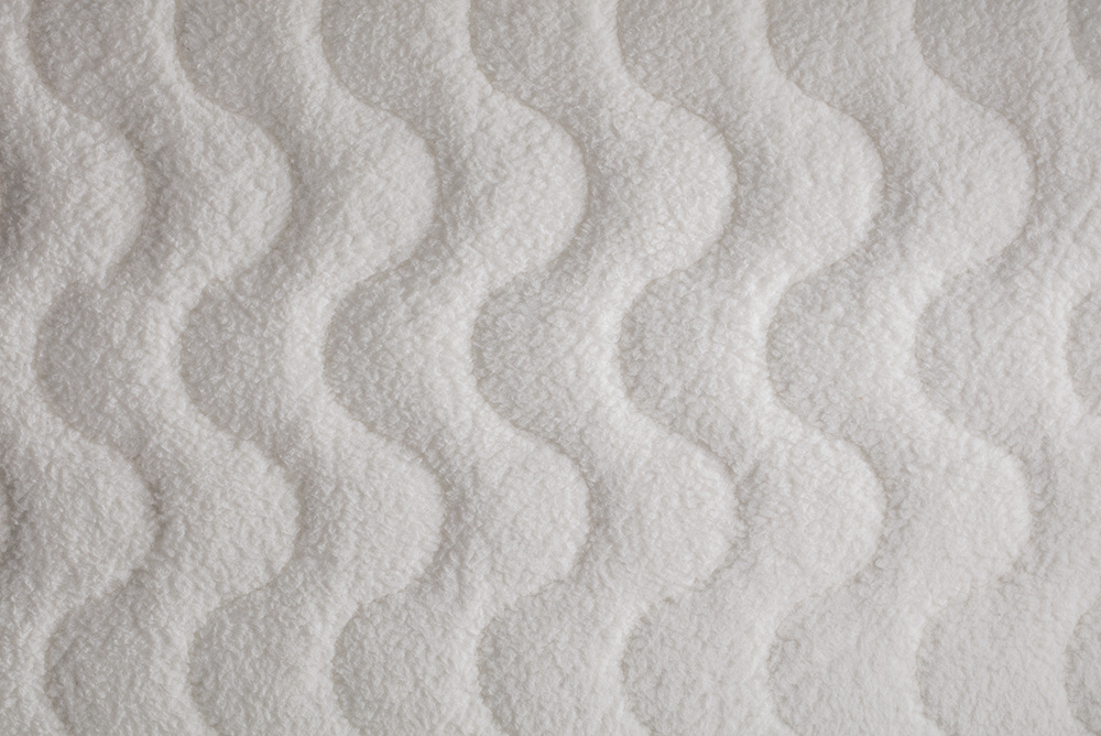 Surface in embroidered pure virgin Merino wool